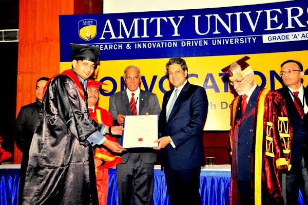 Varun Kumar Manik receiving his M.Tech degree on stage at Amity University Lucknow convocation